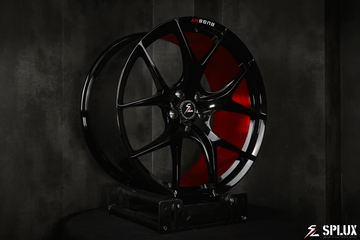 Splux SL-01 22-inch black lightweight custom forged rims for 2023 Tesla Model X, featuring brushed red engraving and a one-piece design.