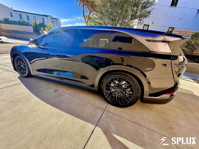 Lucid Gravity wheels on Abyss Black 2026 Lucid Gravity front three-quarter view