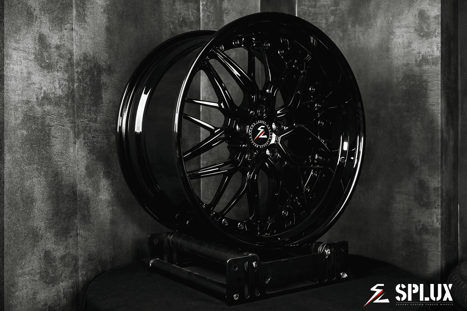 Dodge Challenger staggered wheels with a gloss black finish in 20 inch. Custom forged aftermarket rims for the Challenger.