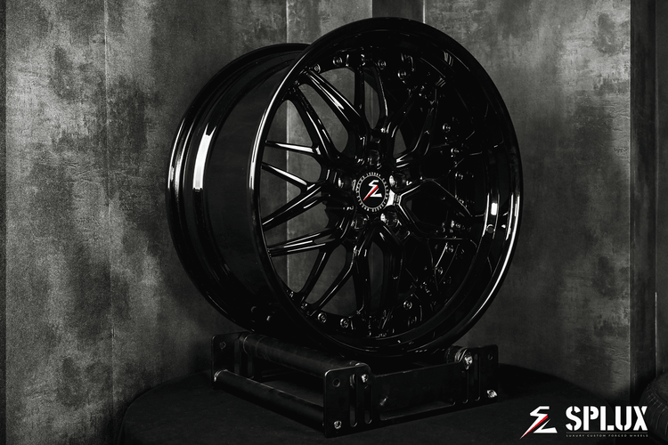 Dodge Challenger staggered wheels with a gloss black finish in 20 inch. Custom forged aftermarket rims for the Challenger.