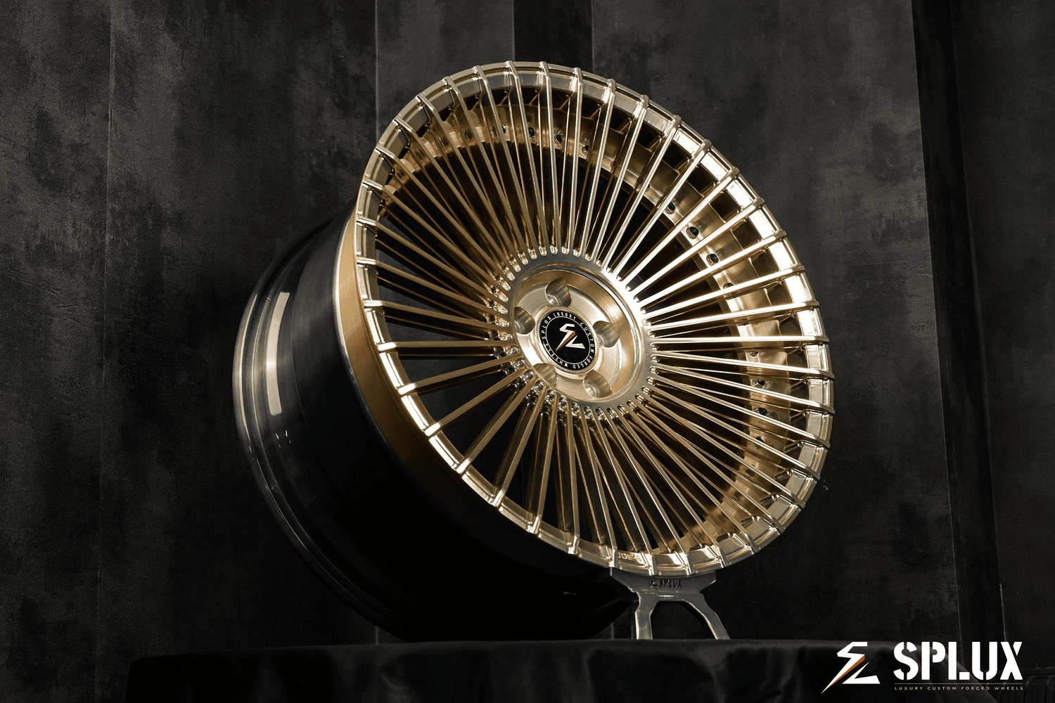 Splux SL-C21 20" custom forged 2-piece wheels for 2017 Porsche Macan, featuring multi-spoke concave design in gold and black.