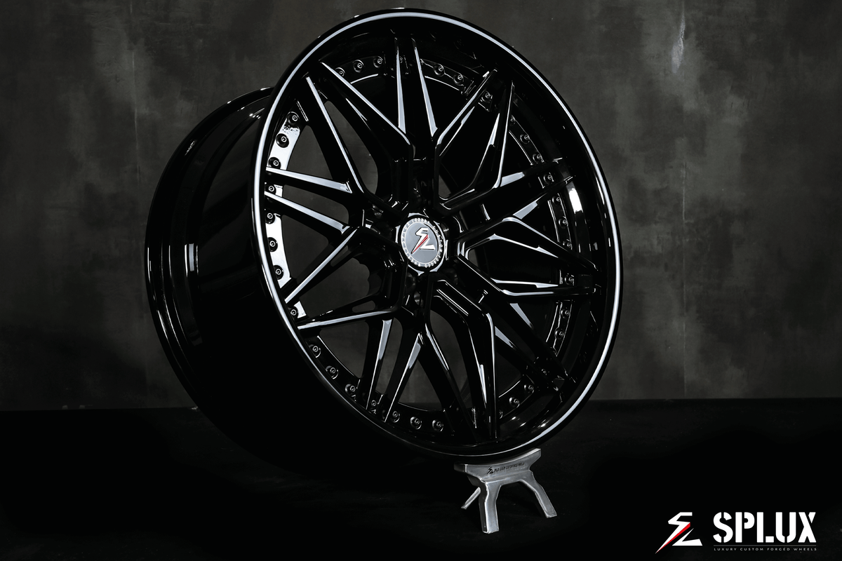 Splux SC-02 custom forged 2-piece black wheels for 2012 Tesla Model S. Aggressive, concave, and deep dish 21-inch aftermarket rims.