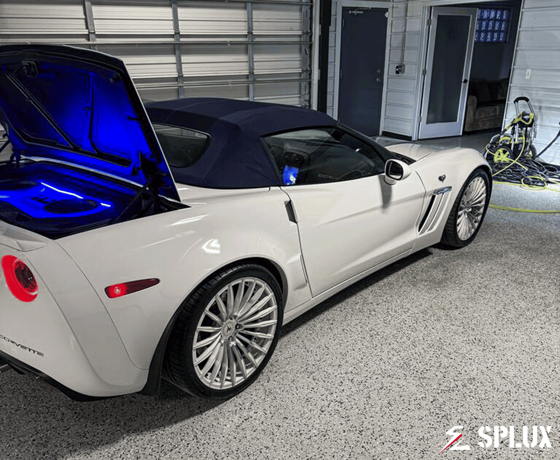Splux Super Luxury Series SL-C24 on a Corvette C6 60th Anniversary Grand Sport in Arctic White with chrome face wheels.