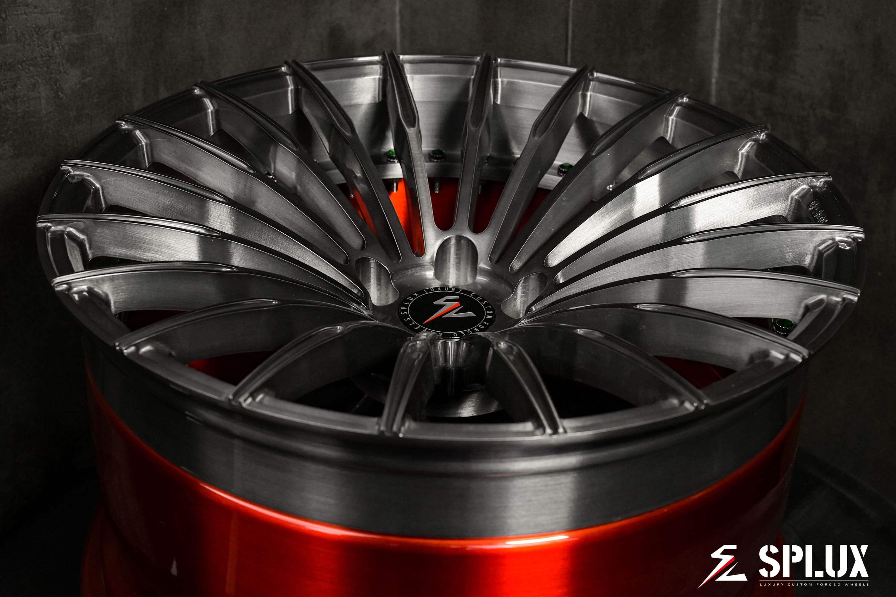 Splux SL-C24 20-inch custom forged 2-piece red wheels and tires for 2014 BMW 228i. Black and red concave aftermarket design.