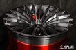 Splux SL-C24 20-inch custom forged 2-piece red wheels and tires for 2014 BMW 228i. Black and red concave aftermarket design.