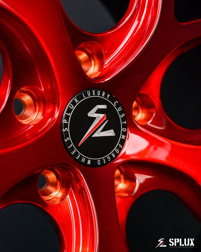 Detail view of C7 Corvette red forged wheels SL-04 1-piece Y-spoke design