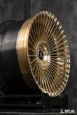 Splux SL-C21 20" custom forged 2-piece wheels for 2017 Macan Turbo, luxury multi-spoke concave design in gold and black.