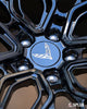 Detail close-up of black Corvette Convertible forged wheels SC-02 custom finish