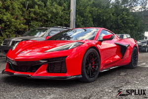 Torch red Splux SL-C07 Forged 2-Piece wheels on Corvette C8, featuring ultra concave design and custom emblem caps.
