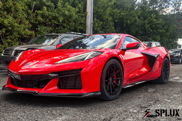 Torch red Splux SL-C07 Forged 2-Piece wheels on Corvette C8, featuring ultra concave design and custom emblem caps.