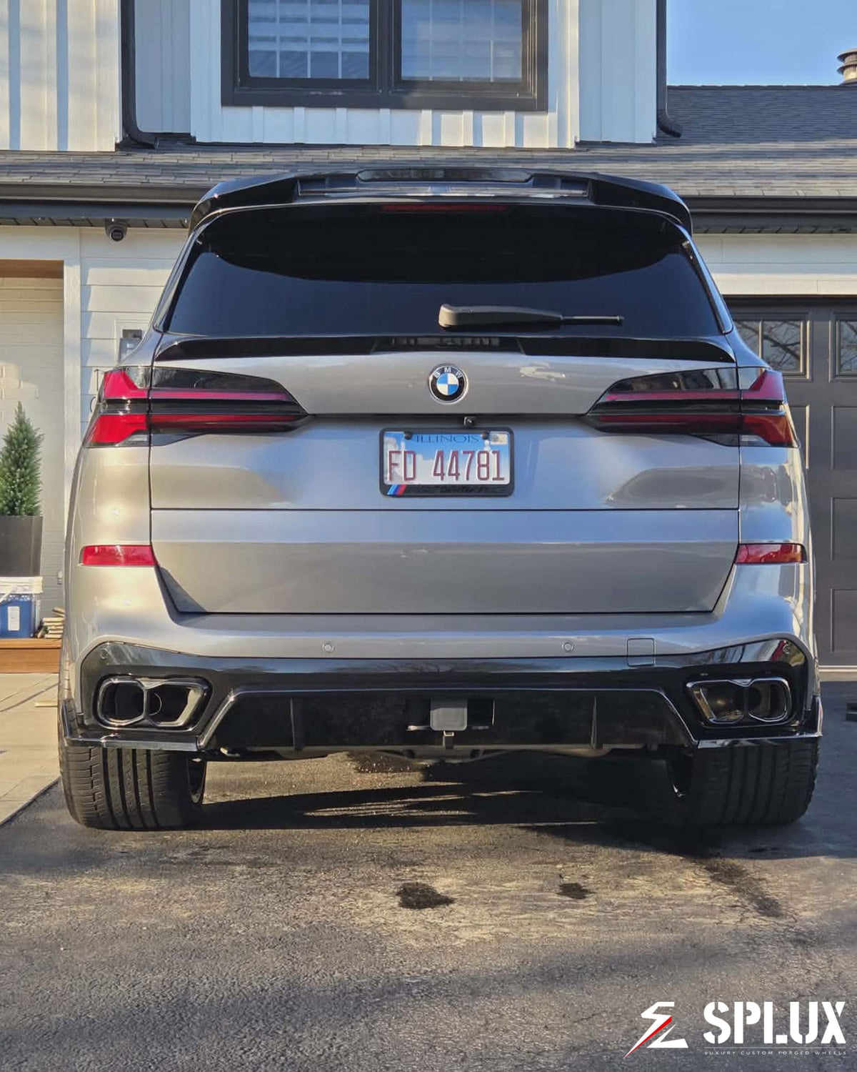 bmw x5 wheels rear fitment view with 22x12 deep-dish setup