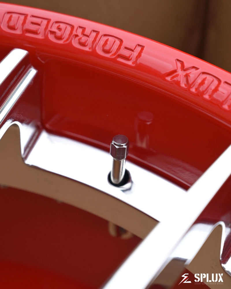 Detail view of chrome red finish SC-04 forged wheels for 2025 Corvette Stingray