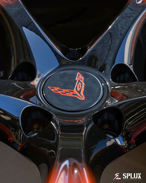 Rear angle showing SC-07M forged 1-piece wheels on Sebring Orange Corvette