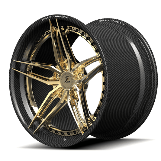 Luxury car wheel with gold accents on a white background