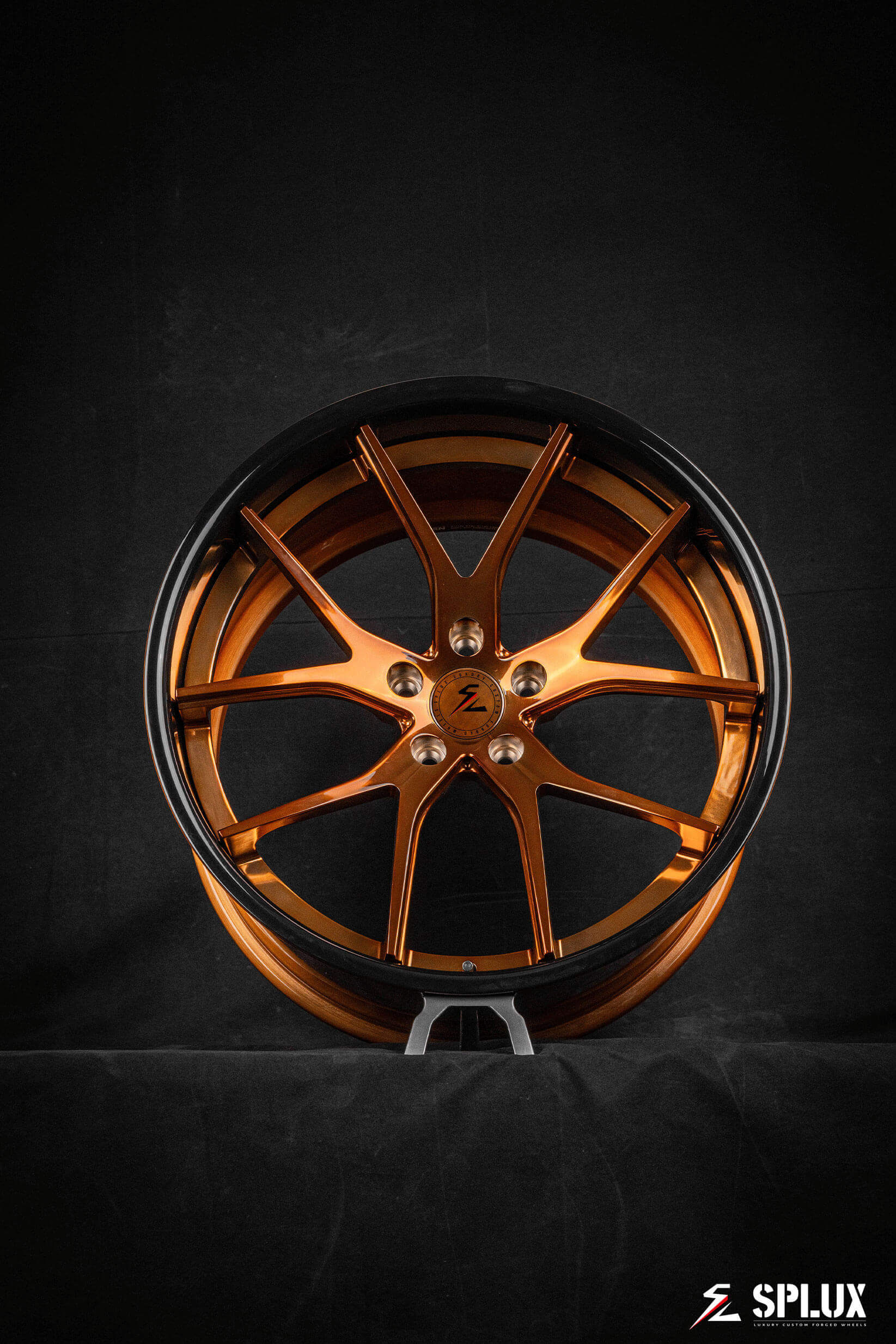 Detailed view of 20 inch piano black wheels with a super concave design for 2024 Corvette C8 Z06 HTC, including a custom center cap.