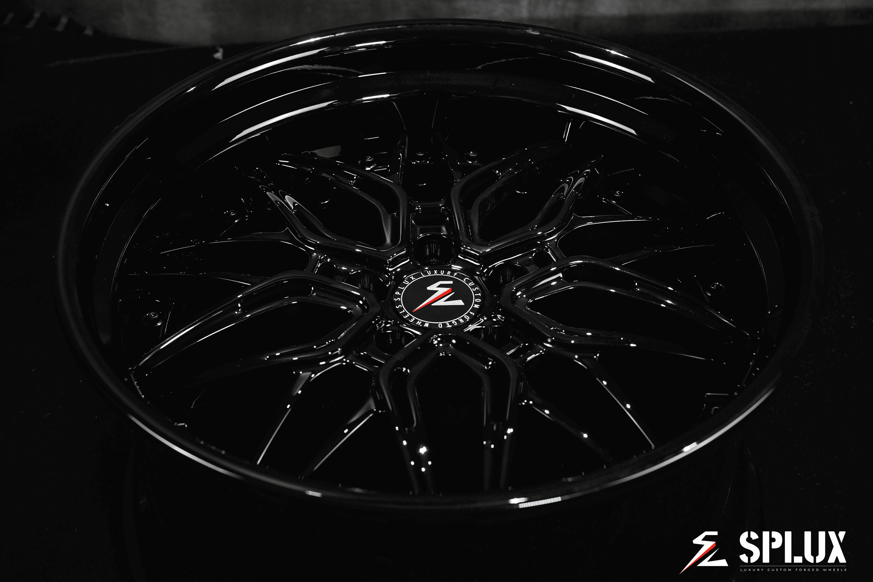 Deep dish rims for Dodge Challenger in 20-inch staggered size. Custom black aftermarket forged 2-piece wheels.