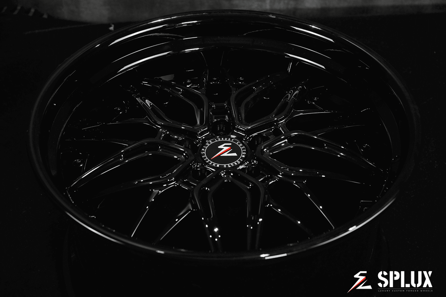 Deep dish rims for Dodge Challenger in 20-inch staggered size. Custom black aftermarket forged 2-piece wheels.