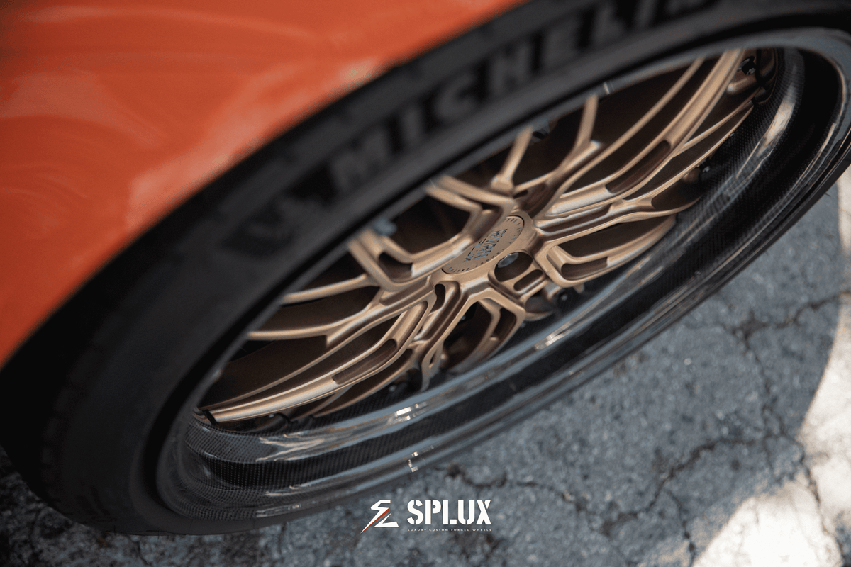 Splux SD-01S forged 2-piece wheel with carbon fiber wrapped lip, luxury bronze finish, for Porsche aftermarket performance.