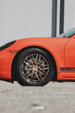 Porsche with Splux SD-01S forged rims featuring a carbon fiber wrapped lip and luxury bronze finish.