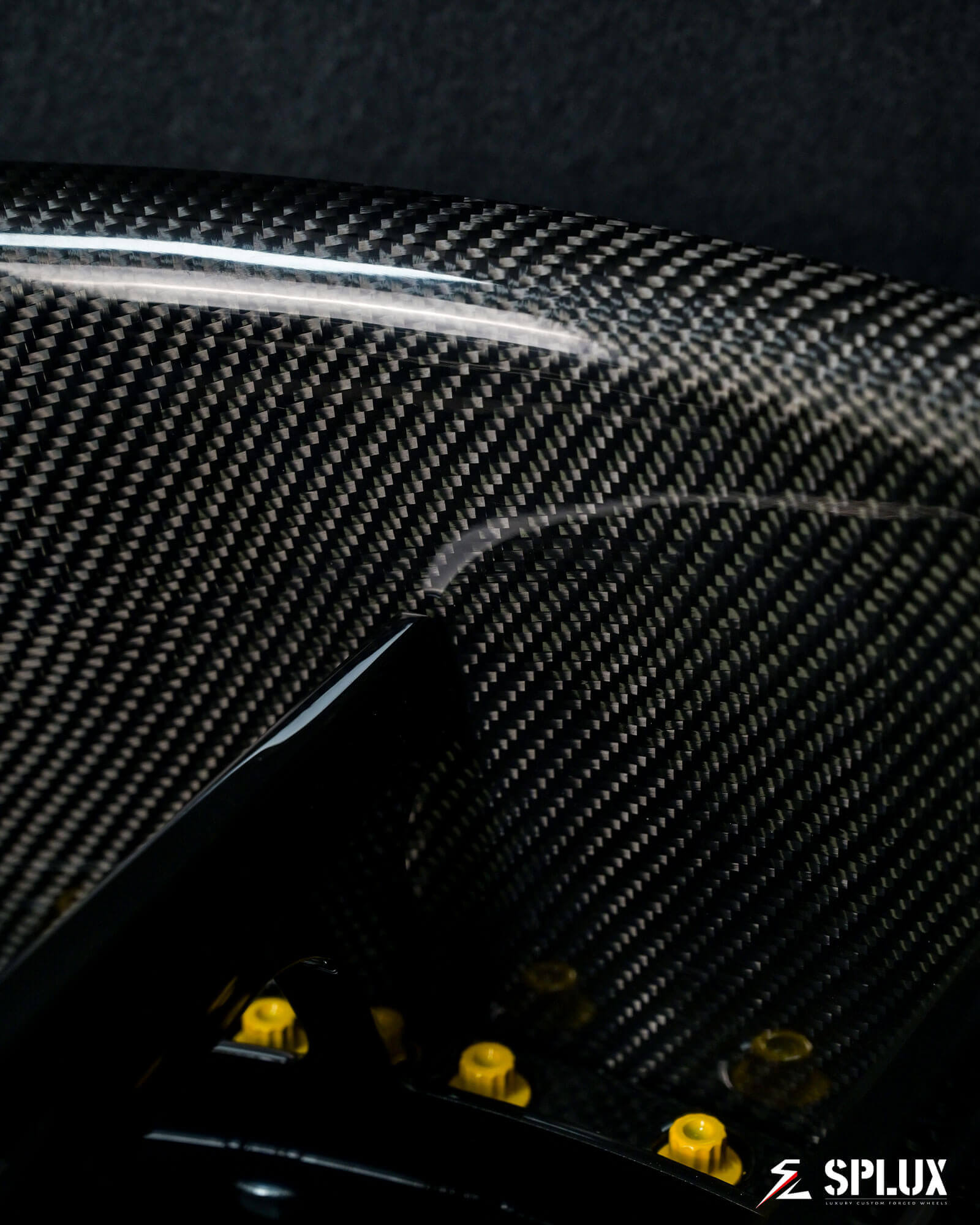 C6 Corvette black wheels with carbon fiber-wrapped lip. C6 aftermarket wheels from Splux forged custom luxury rims.