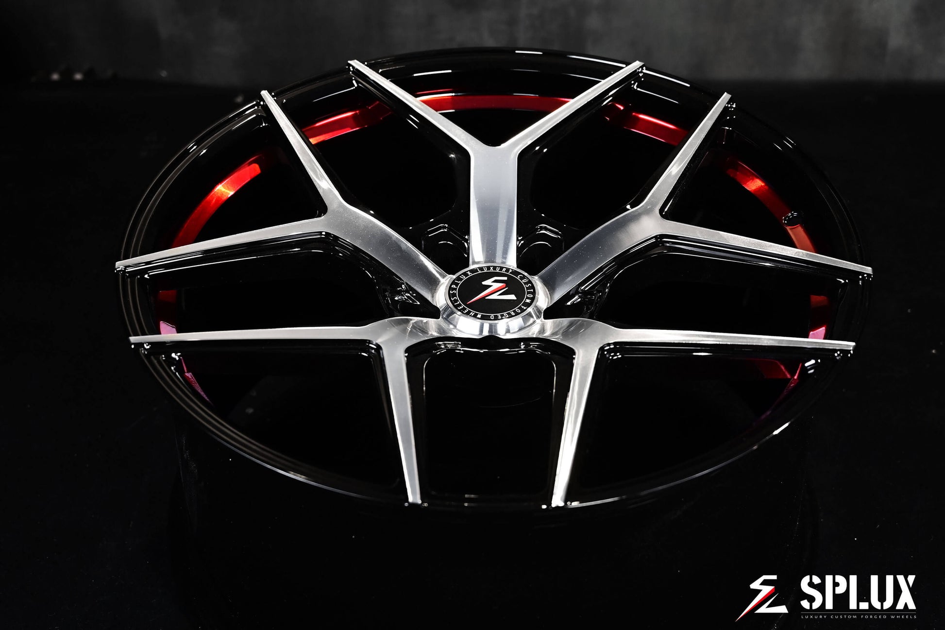 Splux SL-01 21-inch custom forged 1-piece wheels for 2023 Tesla Model S, lightweight, machined, black with red stripe and concave shape.