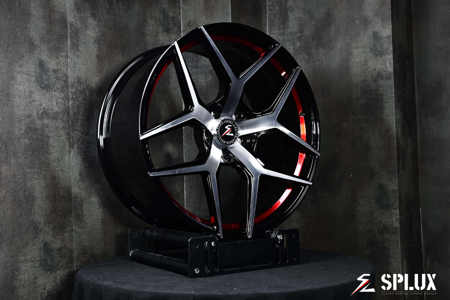 Splux SL-01 21-inch wheels for 2023 Tesla Model S, custom forged 1-piece, lightweight, machined, black with red stripe, featuring a concave design.