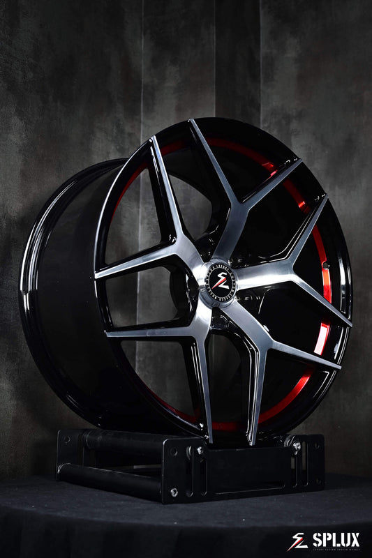 Splux SL-01 21-inch rims for 2023 Model S, custom forged 1-piece, lightweight, machined with black finish, red stripe, and concave shape.