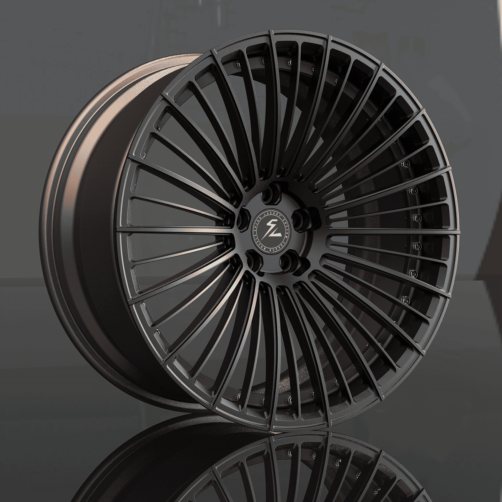 Detailed view of 19 inch matte black multispoke wheels with satin bronze and chrome accents, highlighting a 2-piece design.