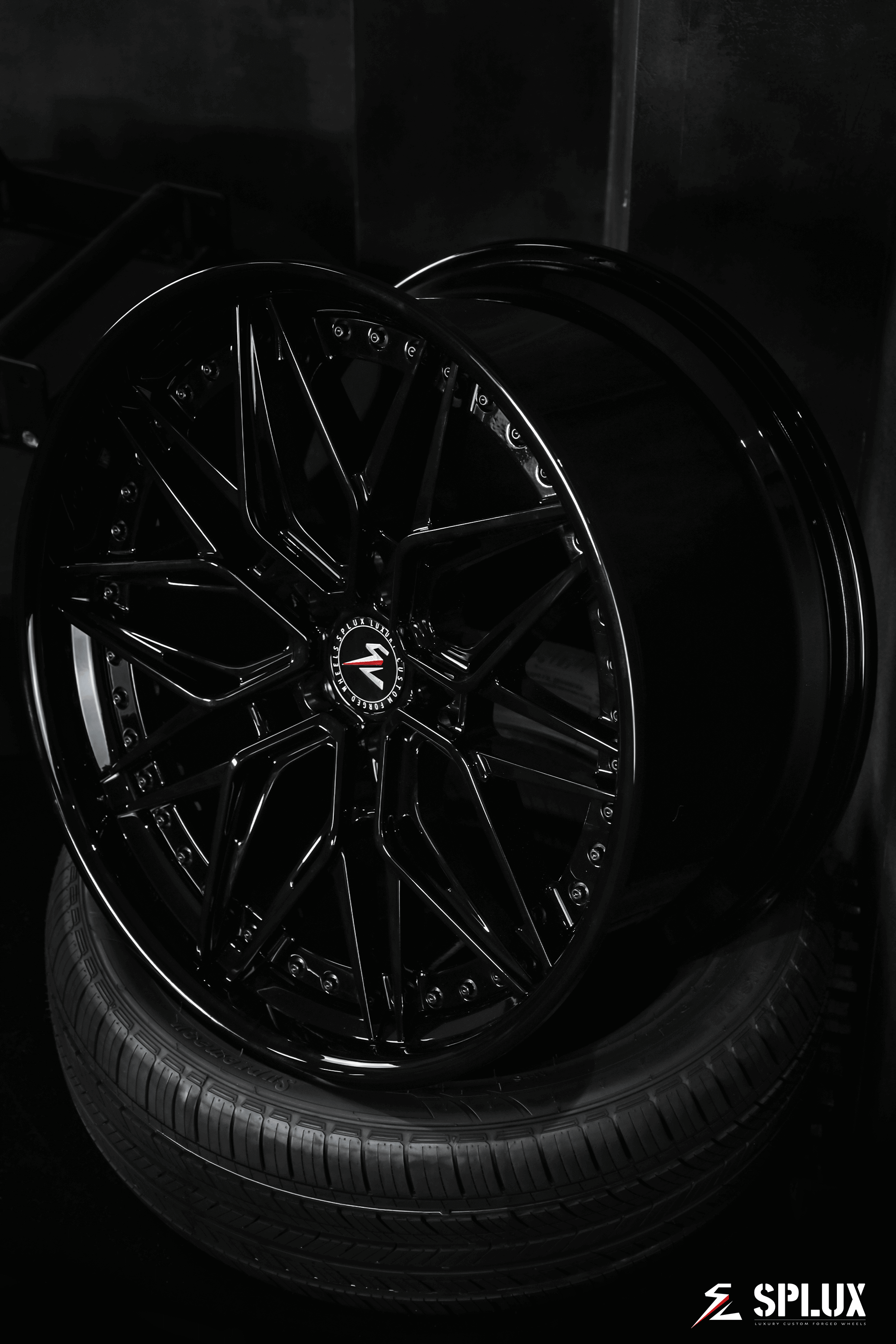 Splux SC-02 custom forged 2-piece black wheels for 2012 Model S. Aggressive, concave, deep dish 21-inch luxury aftermarket rims.