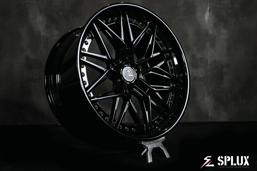 Splux SC-02 custom forged 2-piece black rims for 2012 Tesla Model S. Aggressive, concave, deep dish 21-inch luxury aftermarket wheels.