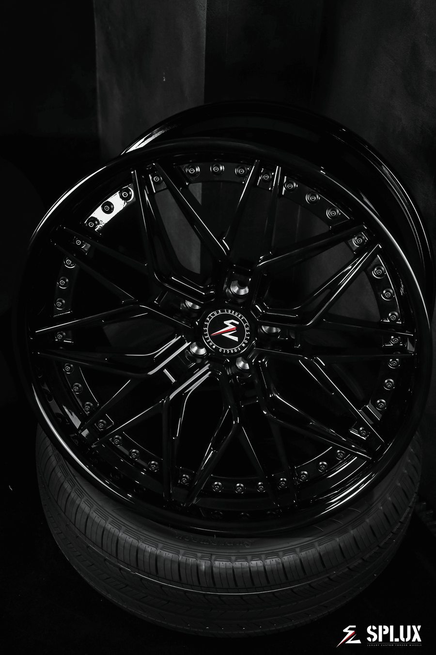 2012 Tesla Model S with Splux SC-02 custom forged 2-piece black 22-inch wheels. Aggressive, concave, deep dish luxury aftermarket rims.