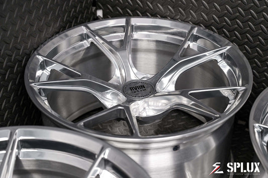 porsche 718 aftermarket wheels with raw polished aluminum finish. deep concave and lightweight design.