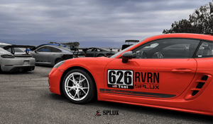 Red sports car with SL-03R wheels at tamale track days, showcasing super lightweight design and y-spoke concave style.