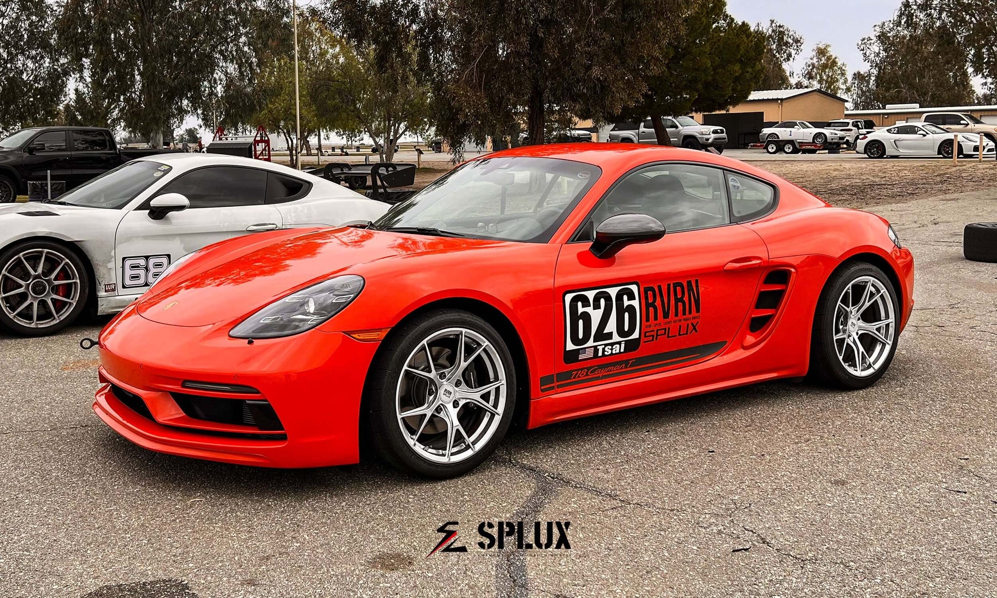 Orange Splux SL-03R forged monoblock wheels on a sporty vehicle at tamale track days, showcasing a super lightweight concave y-spoke design.