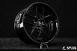 Rear 19-inch SD-02 wheel with deep dish lip and piano black finish