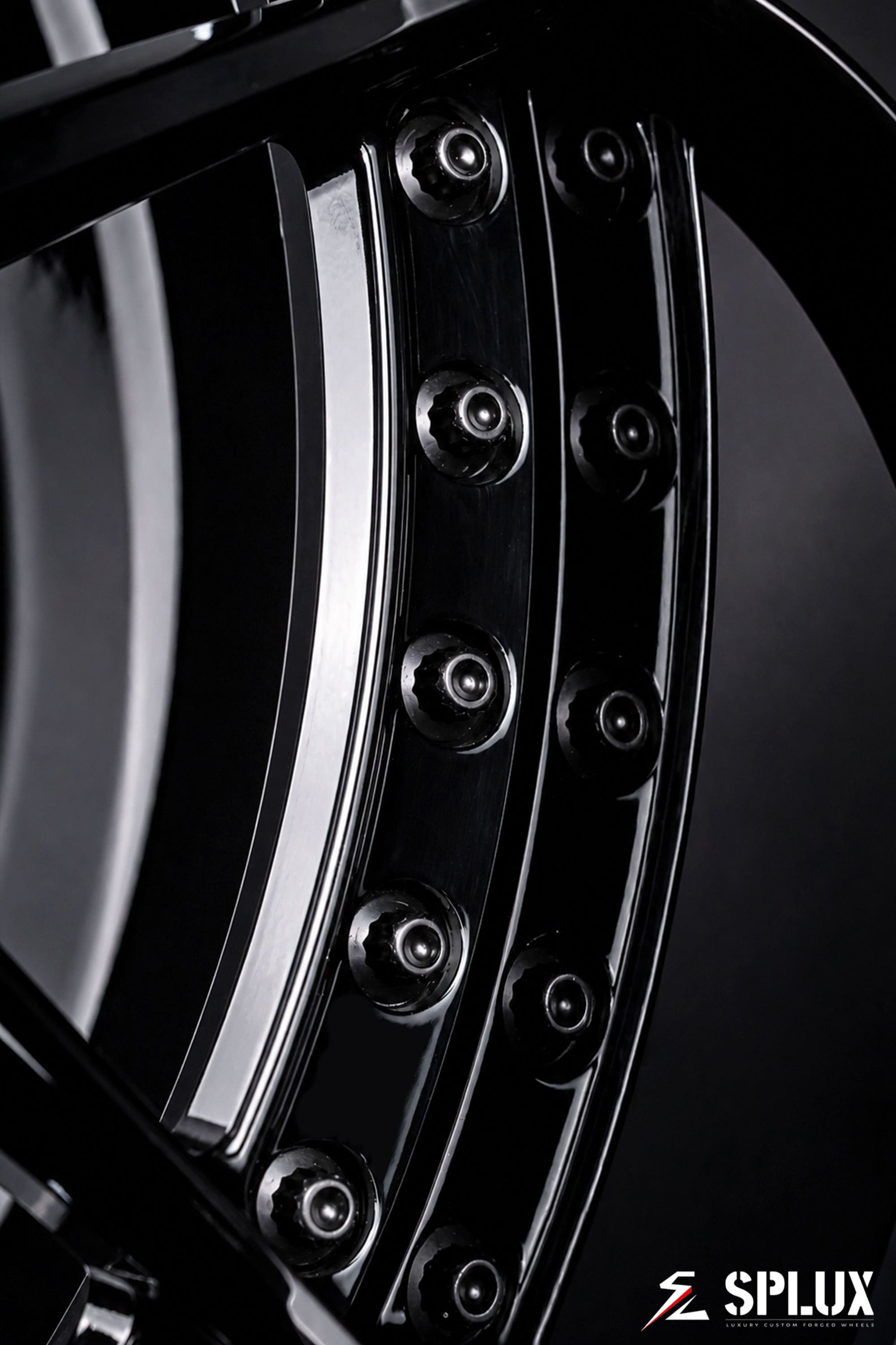 SD-02 forged wheels on the front of the F100, showing the deep-dish barrel and black finish
