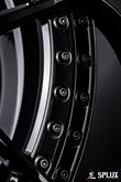 SD-02 forged wheels on the front of the F100, showing the deep-dish barrel and black finish