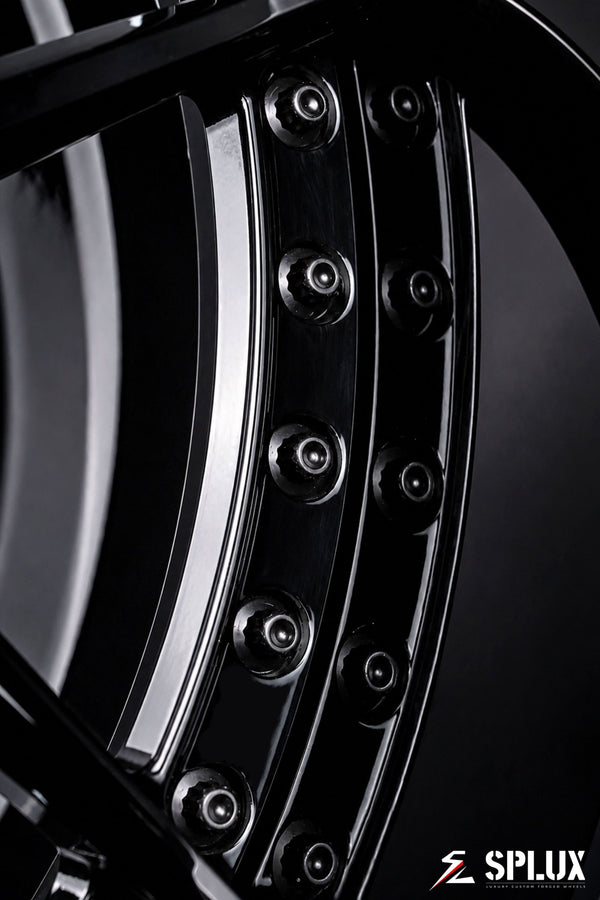 SD-02 forged wheels on the front of the F100, showing the deep-dish barrel and black finish
