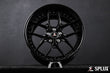 Rear 18-inch SD-02 wheel with wide lip and piano black spokes on the Ford truck