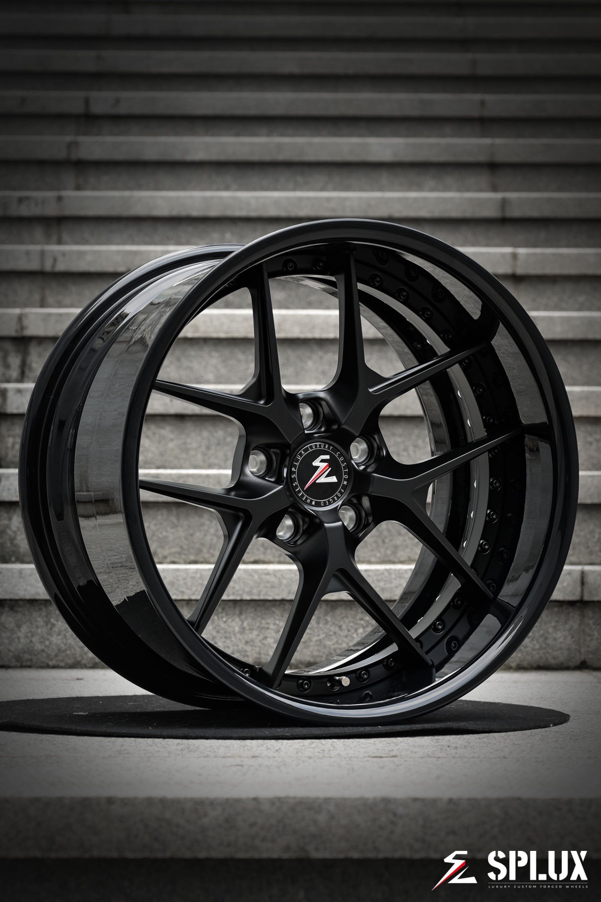 Front 18-inch SD-02R wheel with satin black spokes and piano black rivets