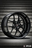 Front 18-inch SD-02R wheel with satin black spokes and piano black rivets