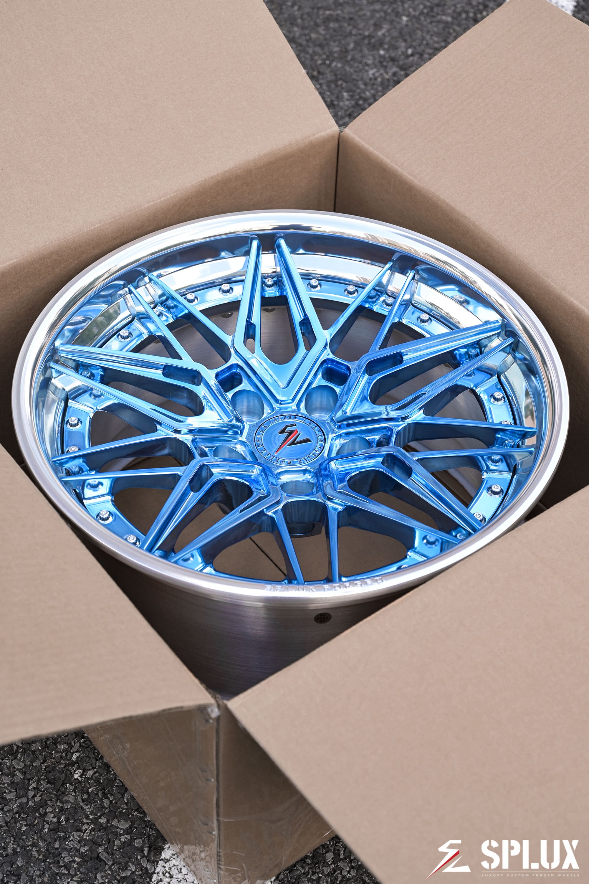 SC-02 forged 2-piece wheel with polished light blue spokes and a deep concave face