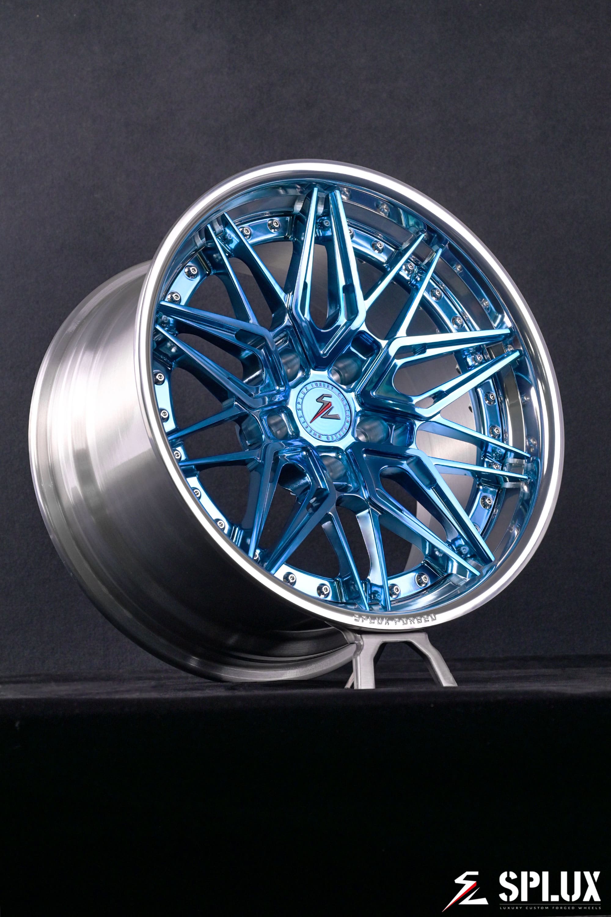 Staggered 18-inch SC-02 wheels with polished light blue spokes on a C3 Corvette