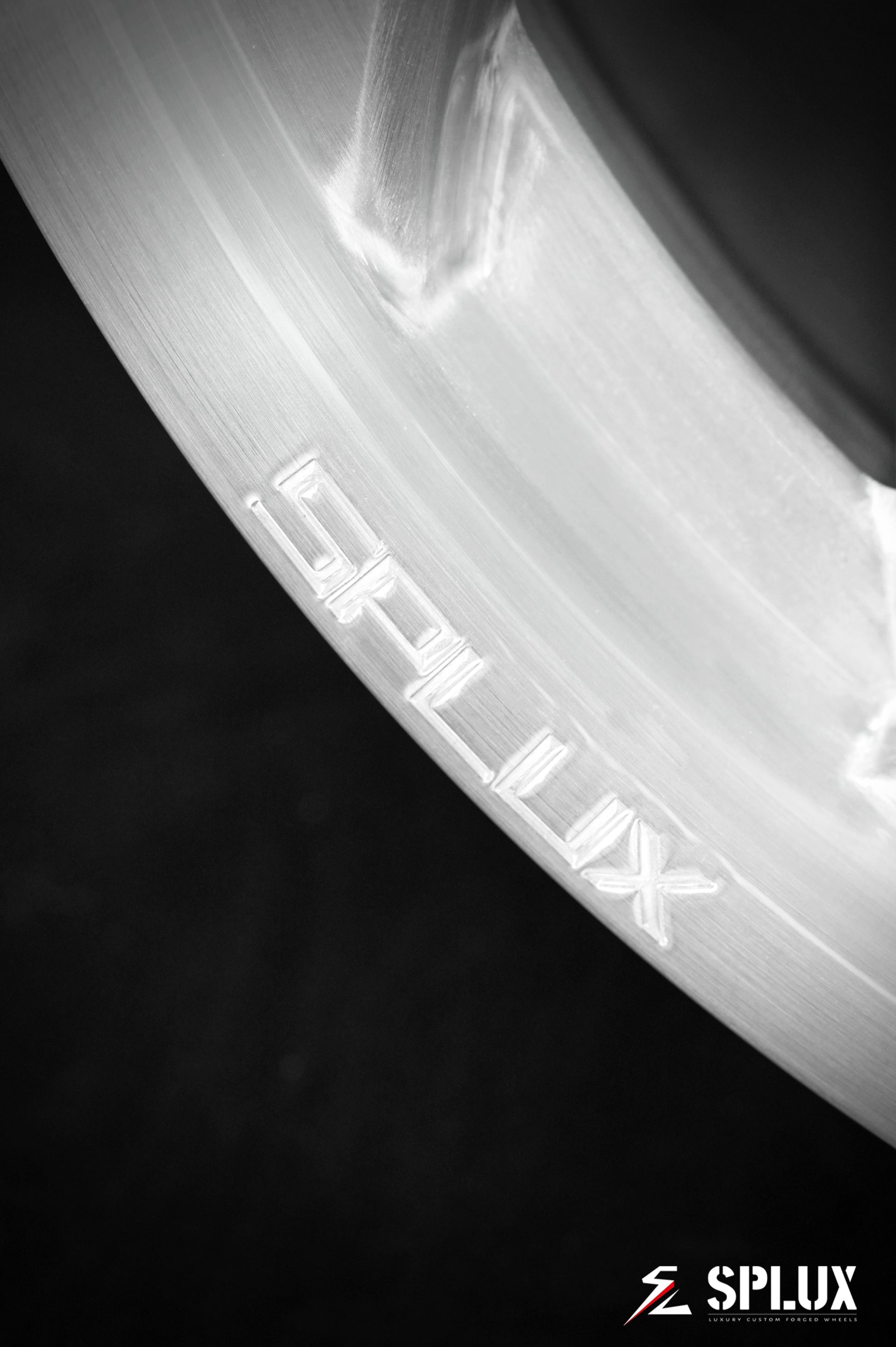 Rear SA-10 wheel with brushed aluminum surface and directional design on a Corvette C4