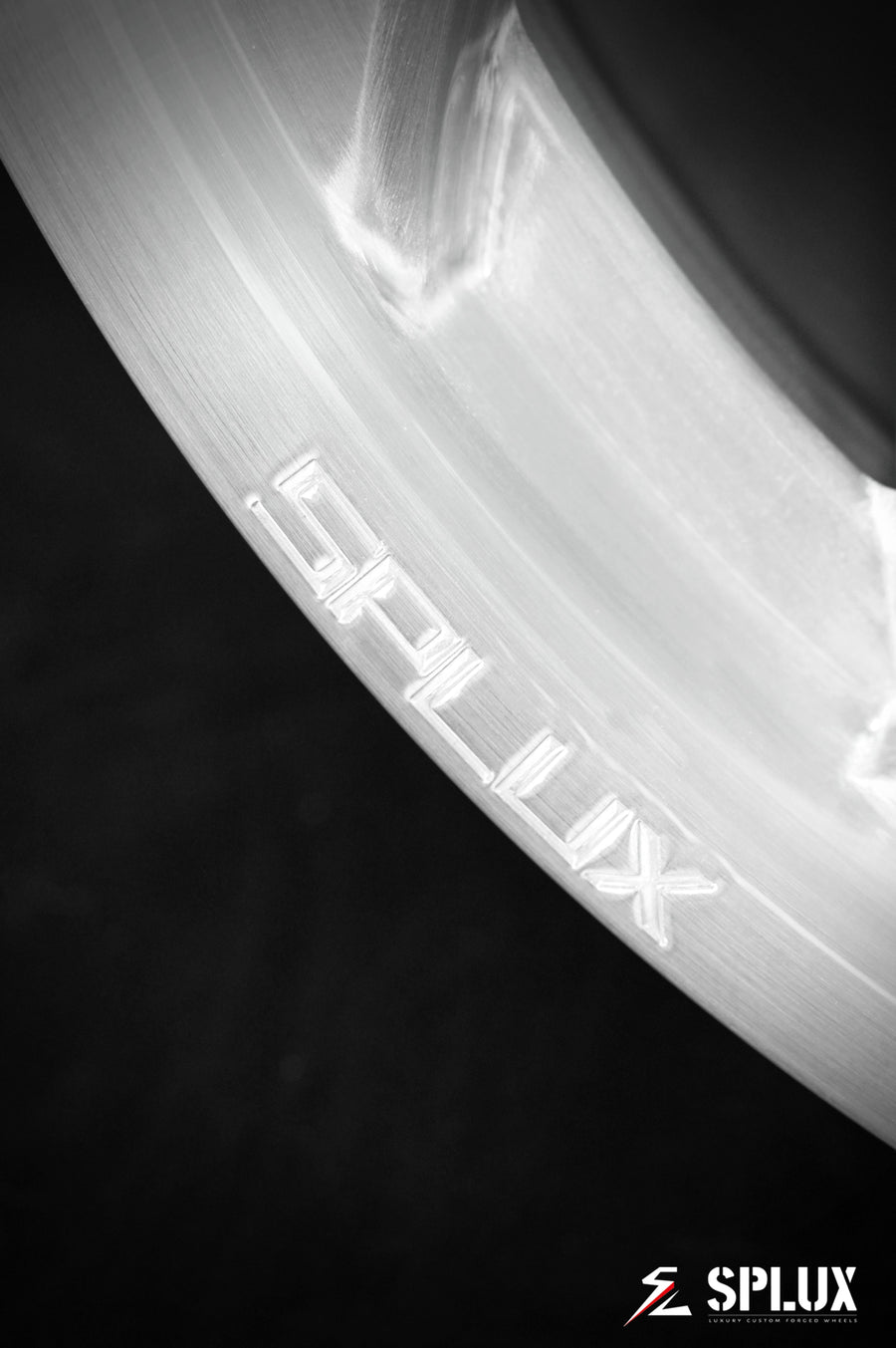 Rear SA-10 wheel with brushed aluminum surface and directional design on a Corvette C4