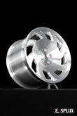 SA-10 wheel with directional spokes and brushed aluminum finish on the rear of a C4 Corvette