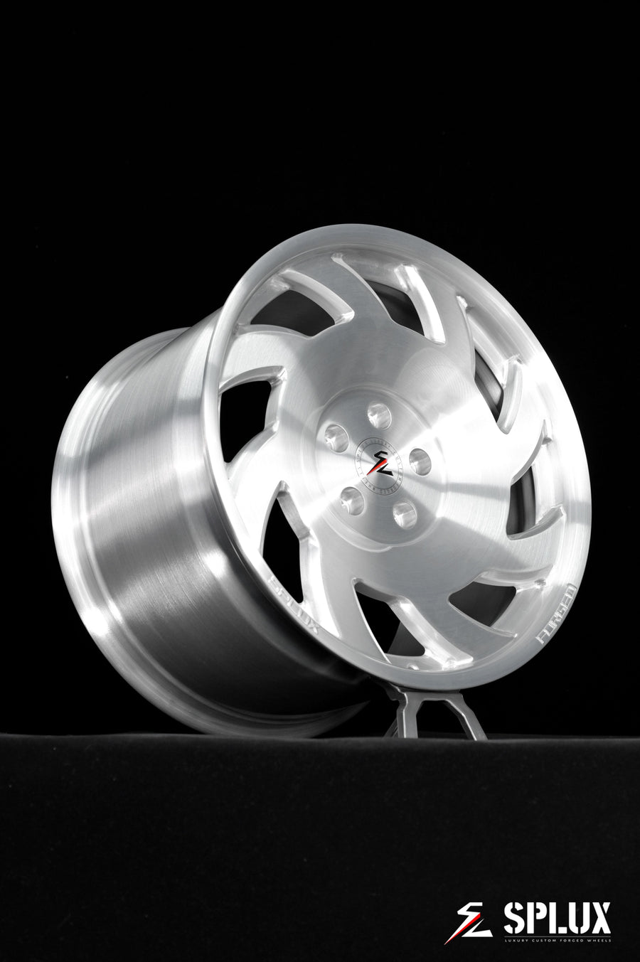 SA-10 wheel with directional spokes and brushed aluminum finish on the rear of a C4 Corvette