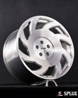 SA-10 forged wheel on the front of the Corvette showing directional spokes and brushed aluminum finish