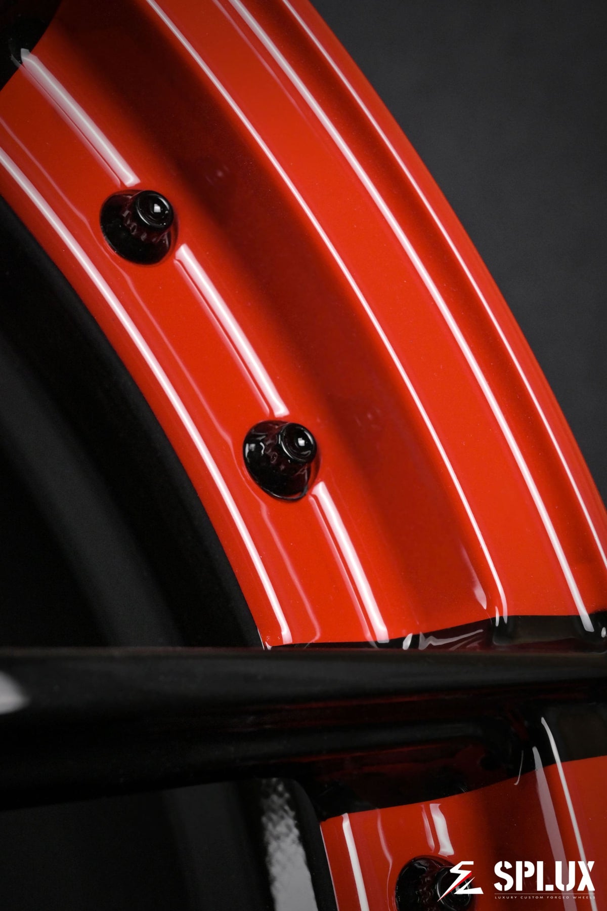 2003 Dodge Viper rims with a gloss red outer lip