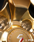 Polished frozen gold spokes and chrome barrel on the SD-06 wheel